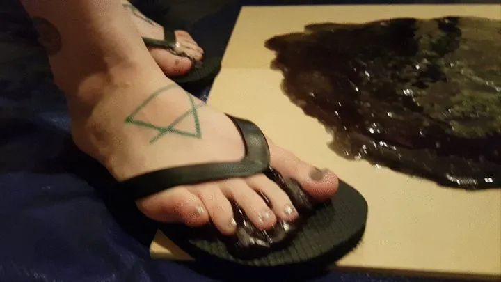 Leeloo Stitches Sticky Black Flip Flops