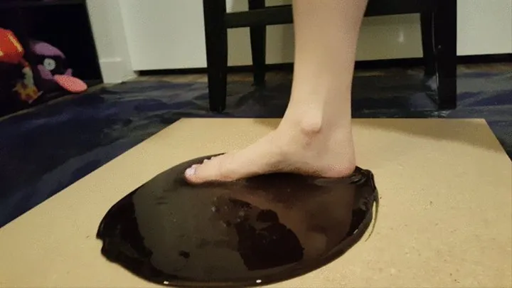 Janet Stuck Barefoot in Black Glue