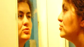 Shaving eyebrow in a mirror