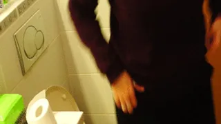 Milf with bun goes to toilet