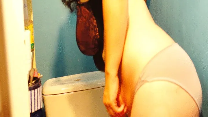 Sexy milf in toilet