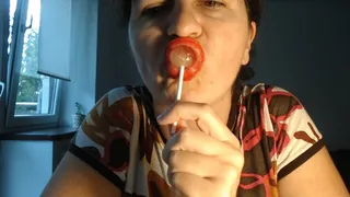 Cherry lollipop and red lips