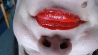 Inverted red lips are kissing you