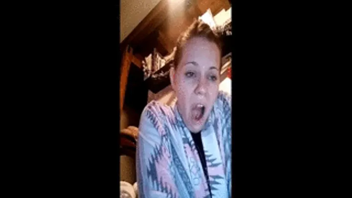 Sick brunette yawning and coughing