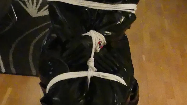 BOUND AND GAGGED IN HEAVY RUBBER