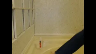 Jean wetting in the tub