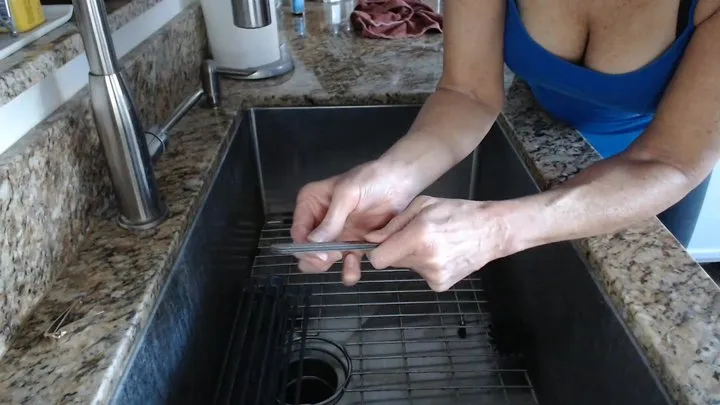 Nail Filing Over Kitchen Sink