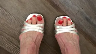 Toe Wiggling In Silver Strappy Sandals