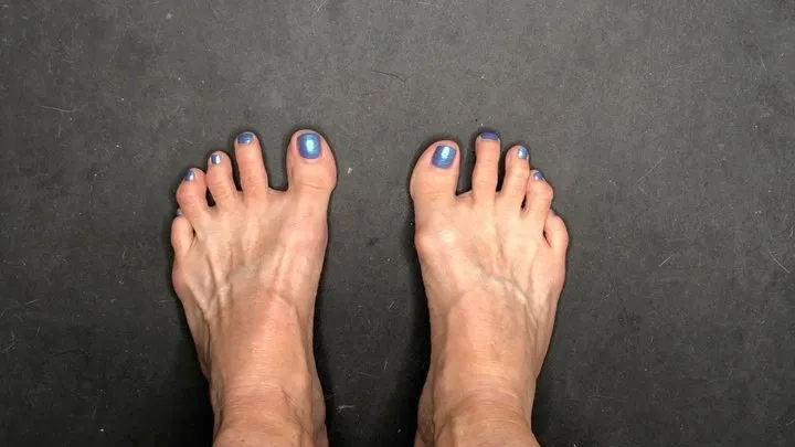 Toe Wiggling With Metallic Blue Toenail Polish