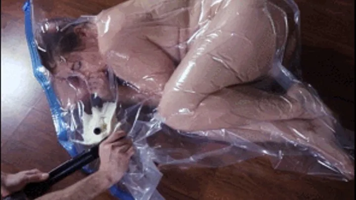 Girl in vacuum plastic bag- I gonna surprise you!