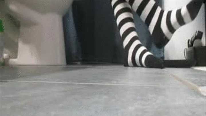 Striped Socks on the Toilet