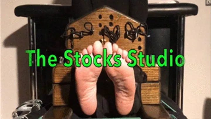 Porcelain Muneca tickled in stocks