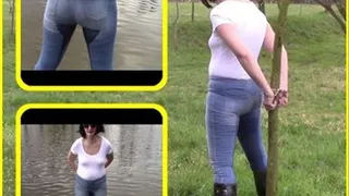 Pee in jeans and handcuffs on the bank of a pond