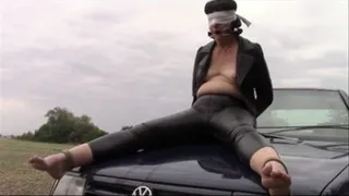 Tied to the car and pissing