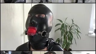 Cuffed Catwoman with cum on latex mask and in mouth