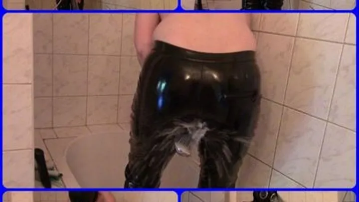 Wet PVC trousers (Showering in handcuffs and gas mask)