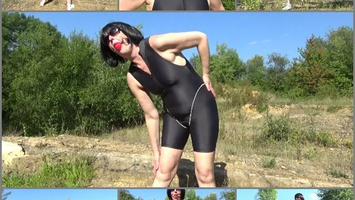 Ballgagged sportswoman in lycra jumpsuit