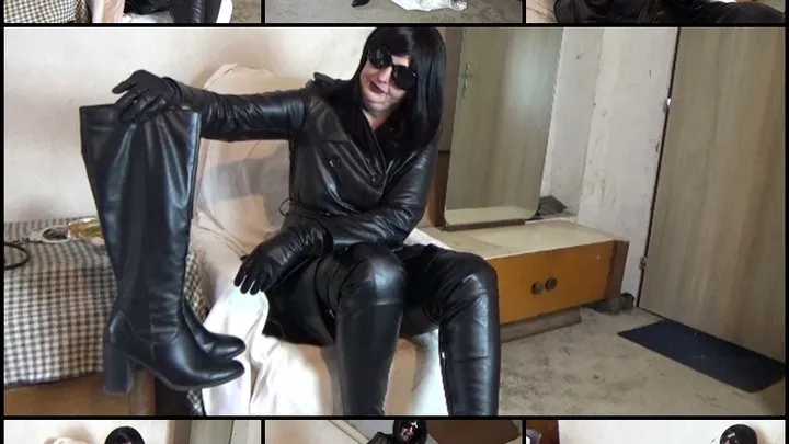 Mistress in a leather coat and high boots