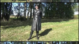 Handcuffed and ballgagged Mistress in a double-breasted leather coat