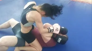The tiny Gloria beating the sorry ass of a big guy