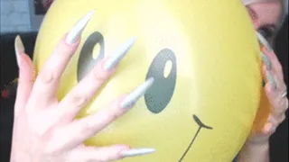 smiling balloon popping