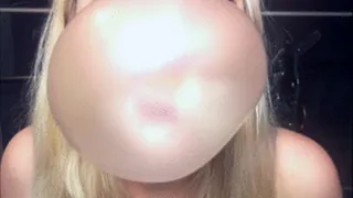 blonde blowing bubbles