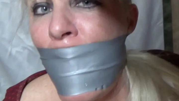 BANK TELLER TAPED AND . GAG TALK