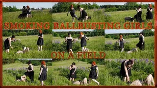 Smoking ballbusting girls on a field