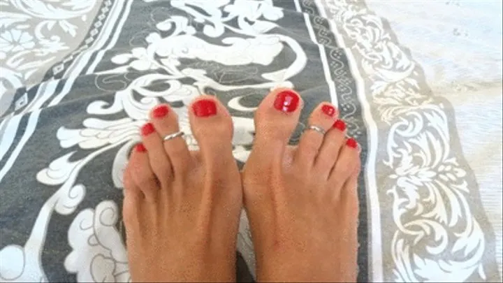 Showing my sexy red painted toes from close view