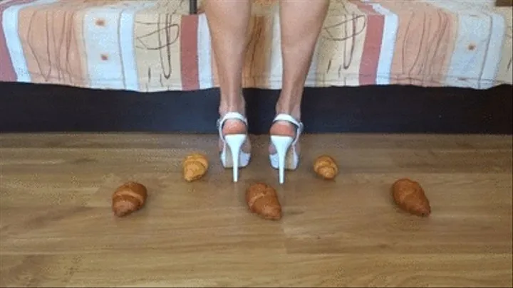 Crushing croissants under my white high heel sandals