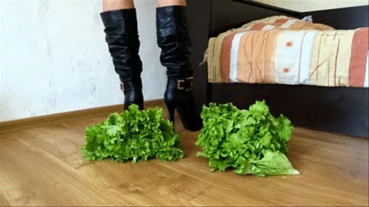 Crushing lettuce with my black high heel boots