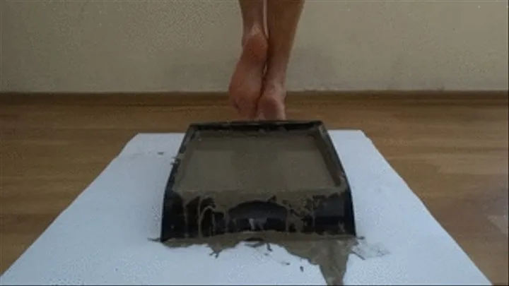 Playing with wet cement barefoot