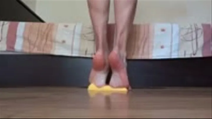 Playing with a sponge with my sexy smelly soles