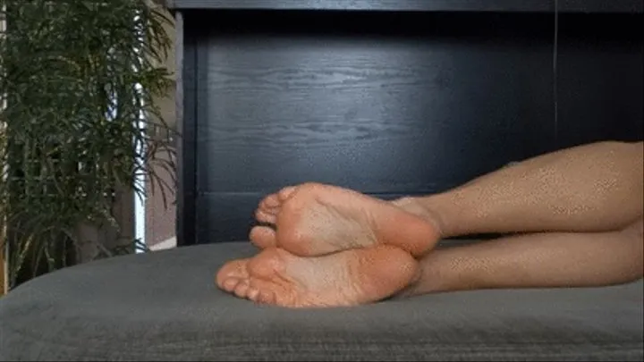 Showing the bottoms of my sexy soles