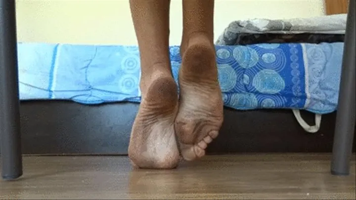 Playing with my dirty feet under the chair - back and side view