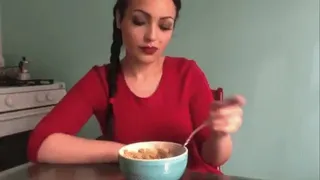 Eating pasta in the Kitchen