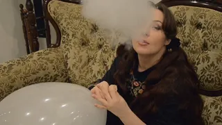 Nathalie Blows To Pop Clear Balloon By Vape