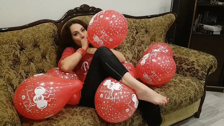 Nathalie Blowing Red Balloons