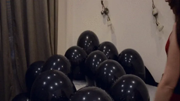 Nathalie Popping Black Balloons