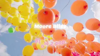 Looner Moore Bliss Blows Up a Handful of Balloons Until They Pop in His Face