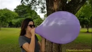 Debby Blow to Pop a Purple 14" Balloon at The Park