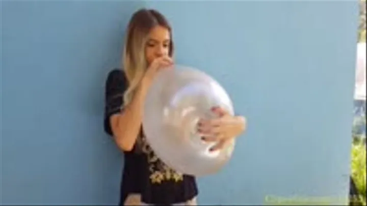 Anna Blows and Nail Pop a Silver Printed BelBal Balloon