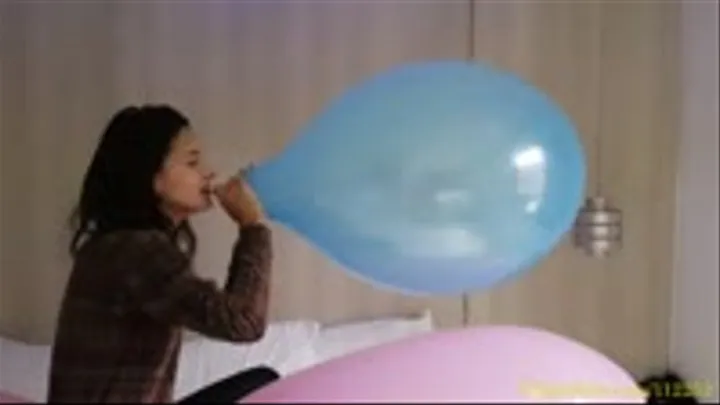 Mandy Blow to Pop a 16" Balloon