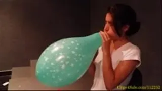 Lucy Blows and Pops 5 Balloons