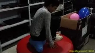 Kim Popping Balloons in the Storage Room