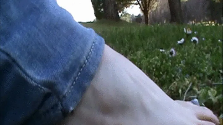 Her sexy feet titillates some flowers -POV