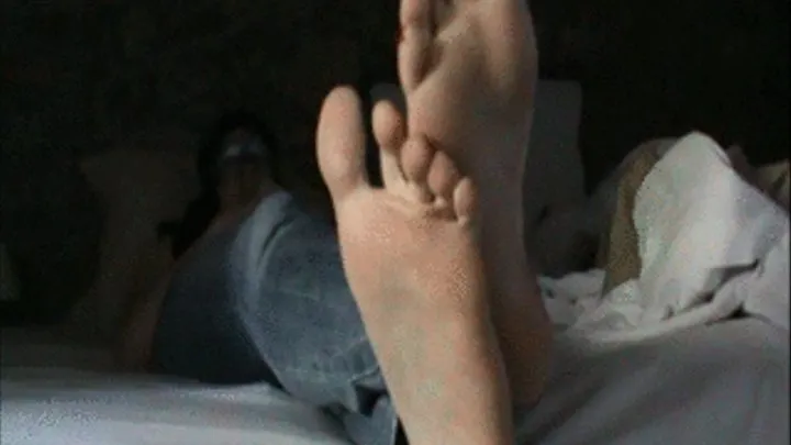 She shows us her feet and lets glimpse her body