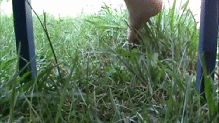 Christine play with grass in the garden