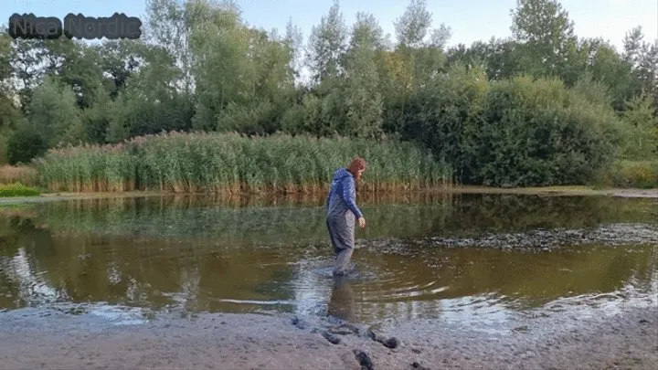 In waders through the deep mud