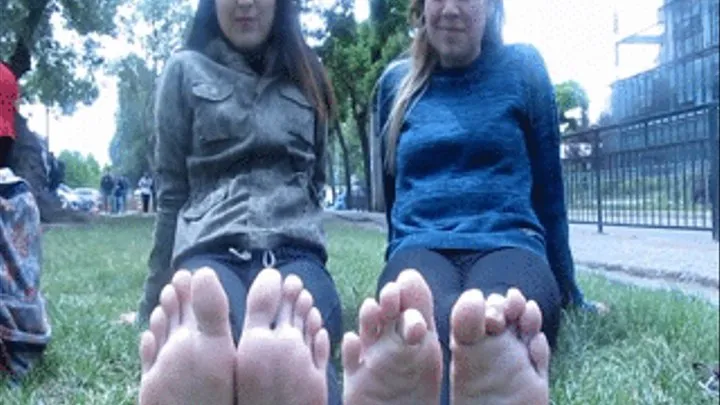 2 girls barefoot at the university